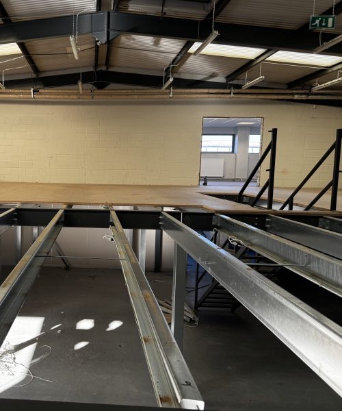 mezzanine floor design and installation with stair and hand rail